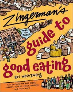 Colorful cover of “Zingerman’s Guide to Good Eating” with food illustrations and bold, playful text.
