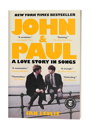 Book cover of “John & Paul: A Love Story in Songs” by Ian Leslie, featuring two men sitting on a railing.